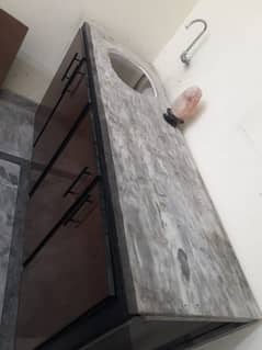 moveable kitchen slab with cabinets