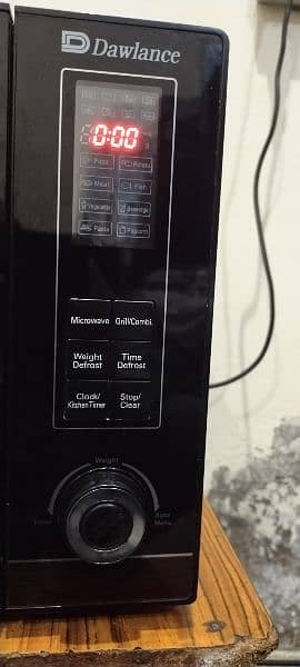 Dawlance DW-133-G is a 30-liter grilling microwave oven 0