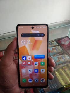 Infinix hot 40i 8+8 128 4 month worrnty left.   box charger Sath han