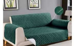 green quilted sofa cover