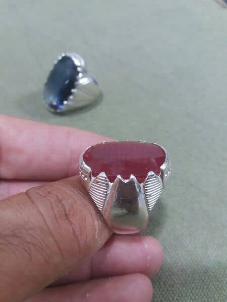 MULTIPLE NATURAL TASBEEH COLLECTION WITH NICE SAPPHIRE AND RUBY RINGS. 16