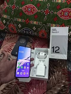 oppo reno 12 F (8/256) . . . GB grey. . . 0