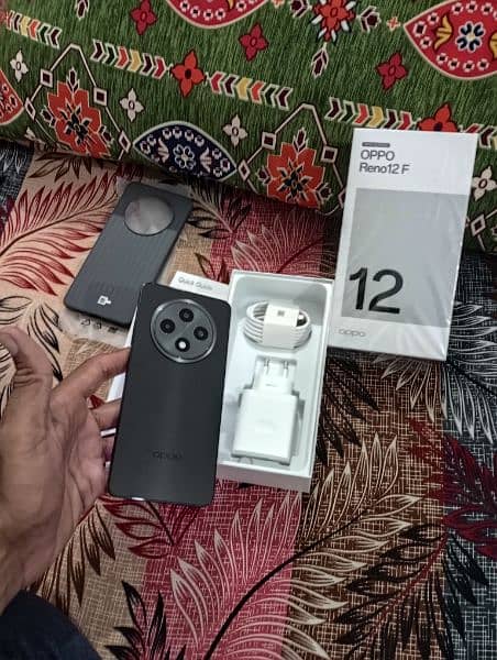 oppo reno 12 F (8/256) . . . GB grey. . . 1