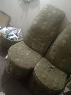 used pair of of long sofa chairs with round table