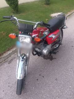 Honda 125 motorcycle condition 10/9 Islamabad number.