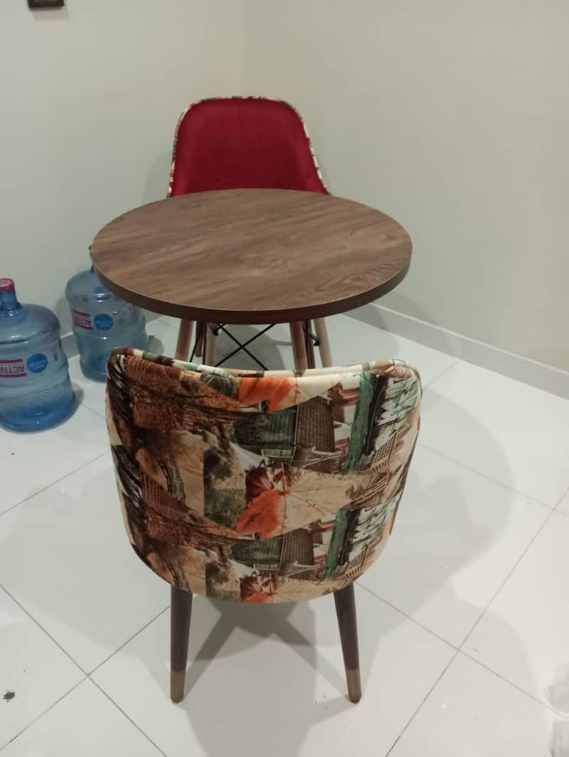 Brand new stylish chair with table . 1