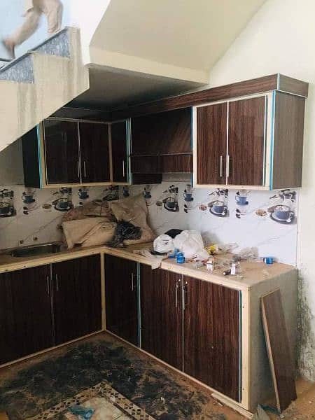 All kinds of wood works kitchen almaria doors and repairing available 14