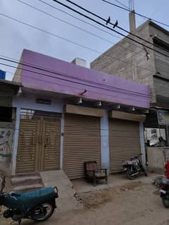 House for sell with Two Shops On link Road