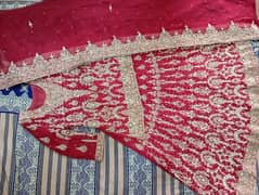 Used Bridal lahenga for seal  24000 . Rs