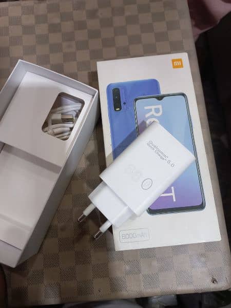 Redmi 9T with box charger good and no open 2