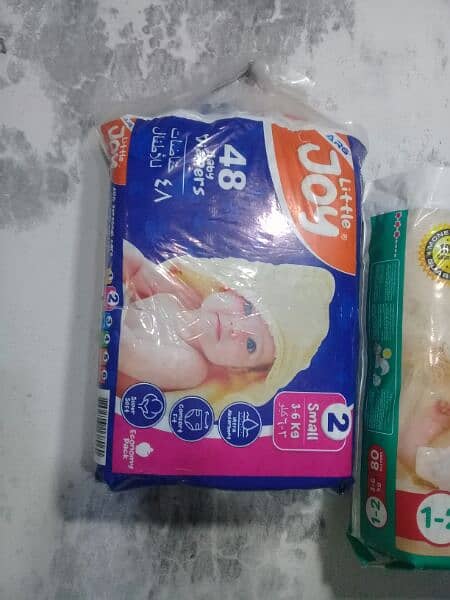 DIAPERS WIPES AND DRY MILK 13