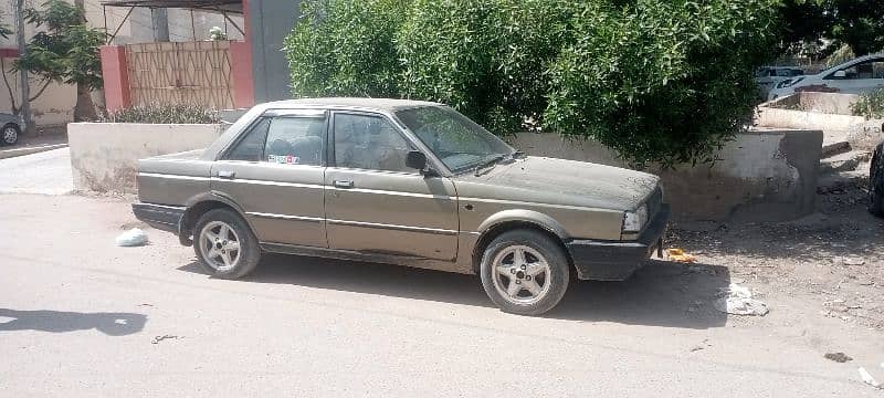 Nissan Sunny 1987 b/t alto coure mehran cultus 5