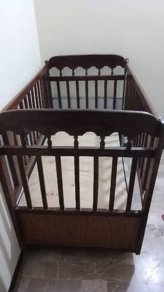 A Sheesham wood Baby cot with 2 drawers