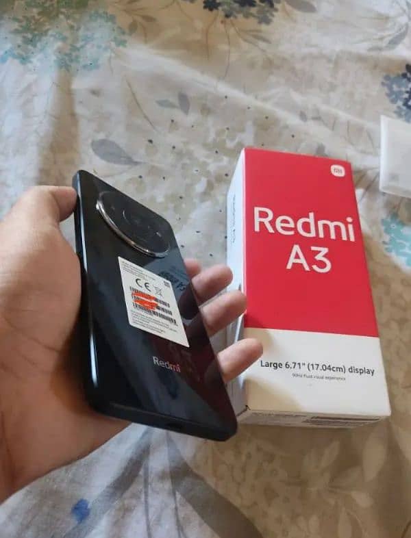 Redmi A3 4 128 with box and charger 1