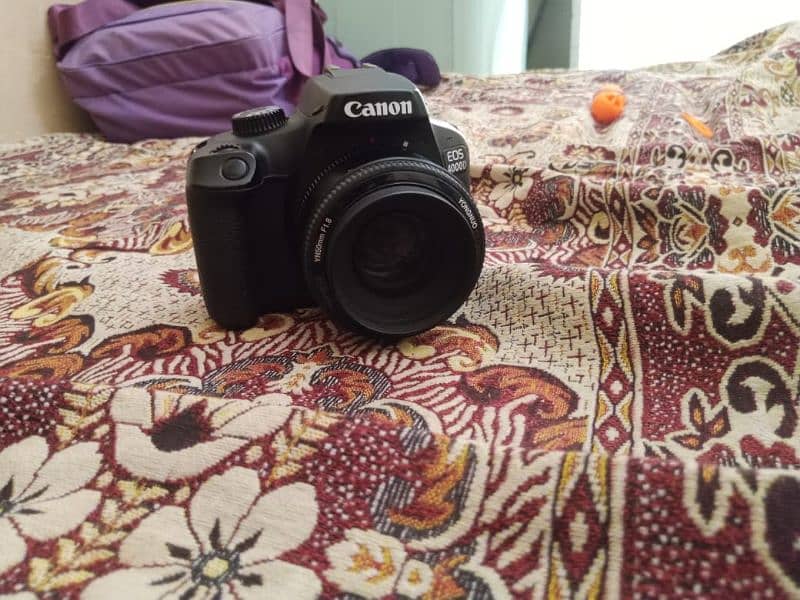 canon eos 4000d with extra lessen 1