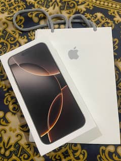 iPhone 16 Pro Max - Desert Titanium with gift pack