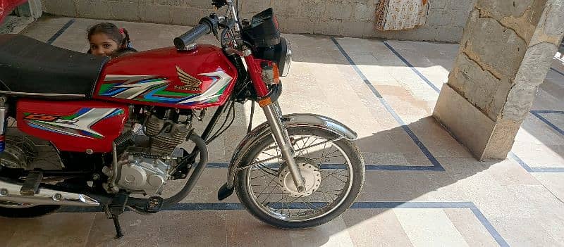 Honda 125 red 2023 model 1