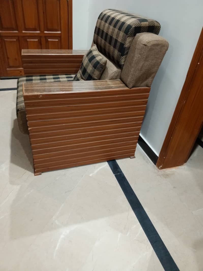 5 seater sofa for sale with tables made of pure wood price negotiable 1