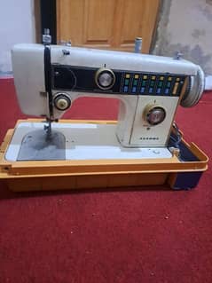 Sewing machine with multiple functions