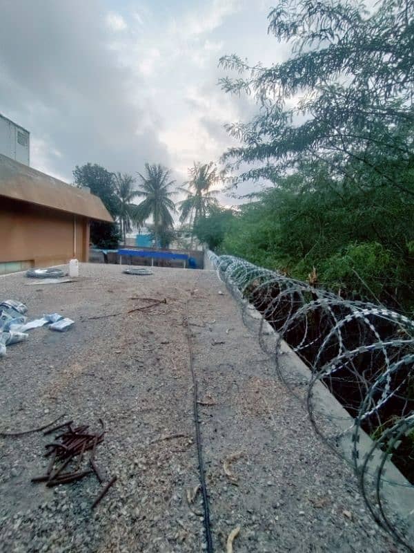 BOUNDARY WALL SECURITY RAZOR WIRE AND ELECTRIC FENCE AVAILABLE 5