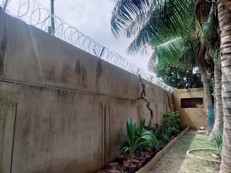 BOUNDARY WALL SECURITY RAZOR WIRE AND ELECTRIC FENCE AVAILABLE 9