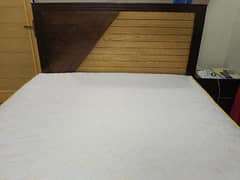 Double bed with mattress and side table for sale