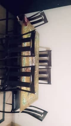 Dinner table with 6 chairs and Glass