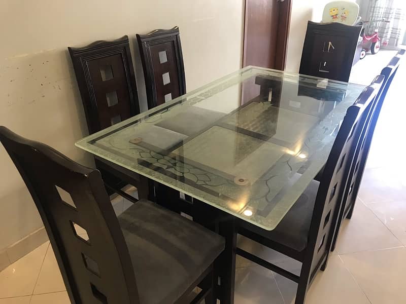 6 Seater Glass top dinning table for sale 1