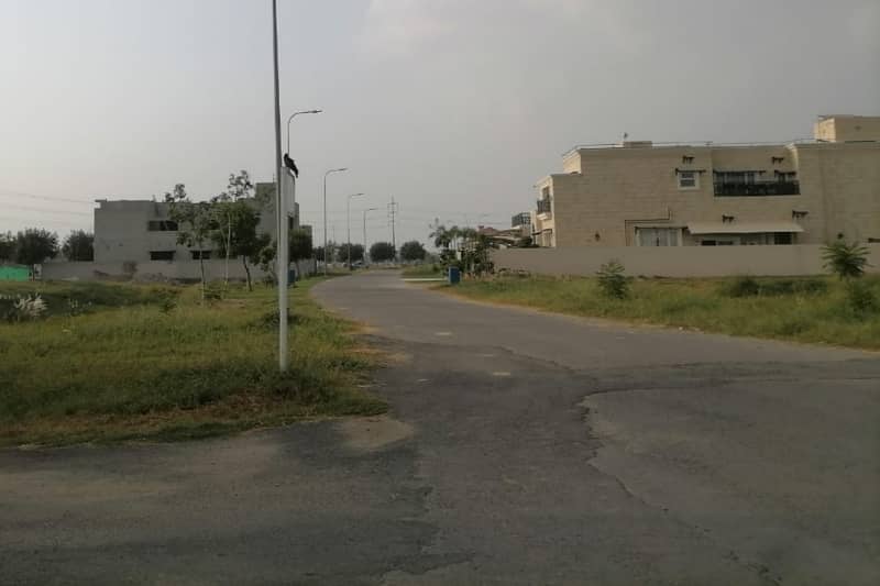 ZEE Real Estate & Builders Offers Near to Raya & GOLF Club LSE back of Main Road In 1 Kanal Available 0