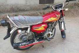 Red honda 125 number lga owa ha