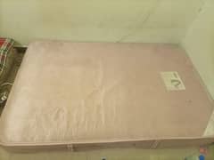 Pink color double bed mattress