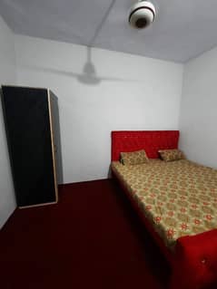 2 ROOMS FULLY SEPARTE AND SEMI FURNISHED FLAT FOR RENT WITH INVERTER WINDOW AC IN MODEL TOWN LAHORE RENT 26000