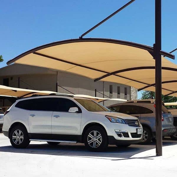 Tensile fabric Car parking shade for protection from heat 0