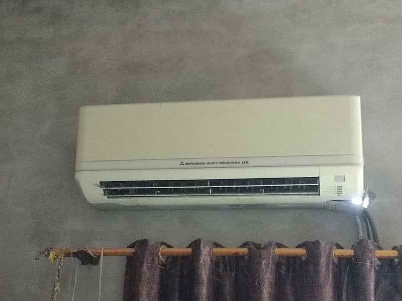 Mitsubishi simple Ac 1.5 in good condition 10 by 8. . 1