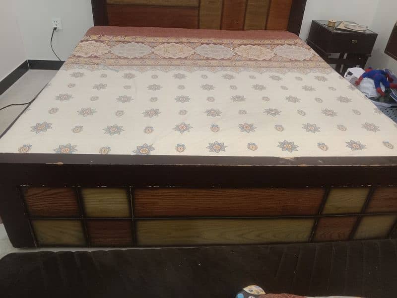 Wooden king size bed 1