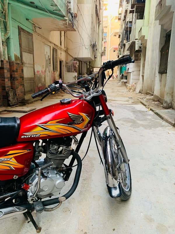 Honda 125 2016 karachi number mint condition return file 2