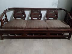 I am selling ,,5 seater wooden sofa