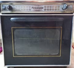 slightly used full size baking oven is available for sale