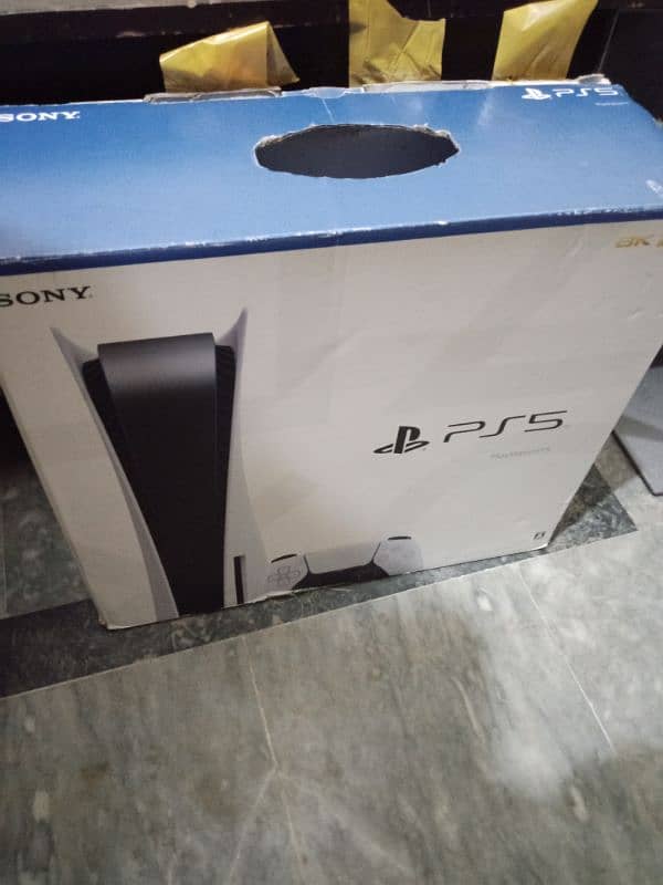 PS5 with box and GTA 5 1