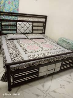 Iron bed with medicated mattress