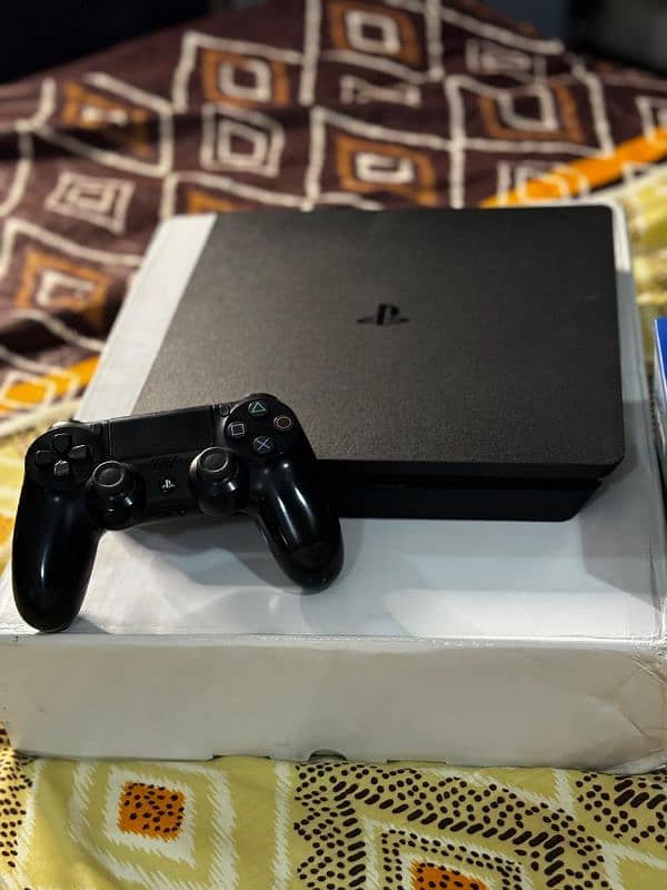 PS4 Slim with 2 controllers with 8 original games 2