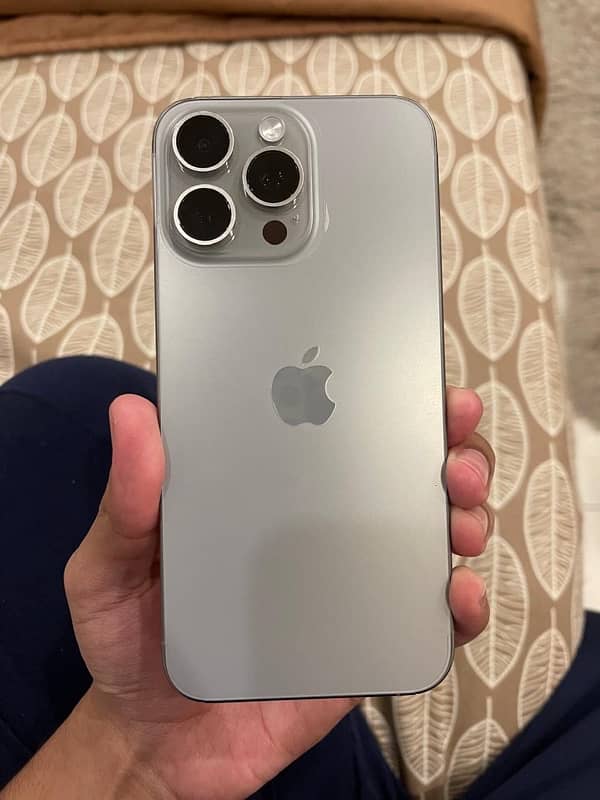 I am selling my. Apple IPhone 15 Pro Max Natural Titanium 5