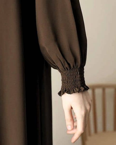 brown abaya with zipper belt and plain black  abaya 1