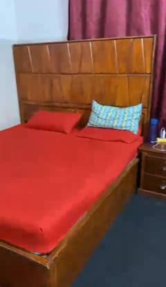 Double bed with one side table