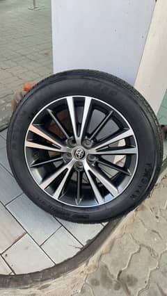 Original toyota grande rims and yokohama tyres up for sale 0