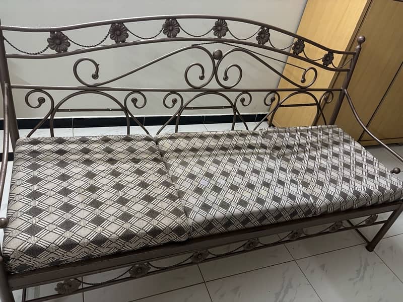 selling this three seater iron rod sofa , 3 months used 1