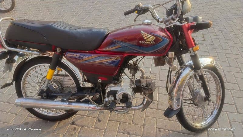 Honda 70cc 2019 model Lahore number lush condition single hand used 3