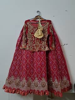 Beautiful bright red lehnga kurti with golden pouch