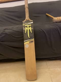 TM bat with free knocking hammer