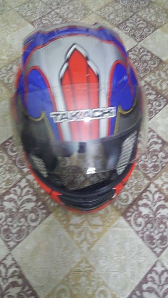 'TAKACHI'Thiland Branded motorcycle helmet. Size, Small. hi 2